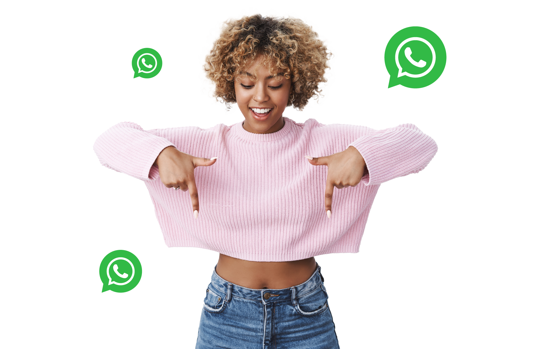 A smiling woman pointing down at her phone